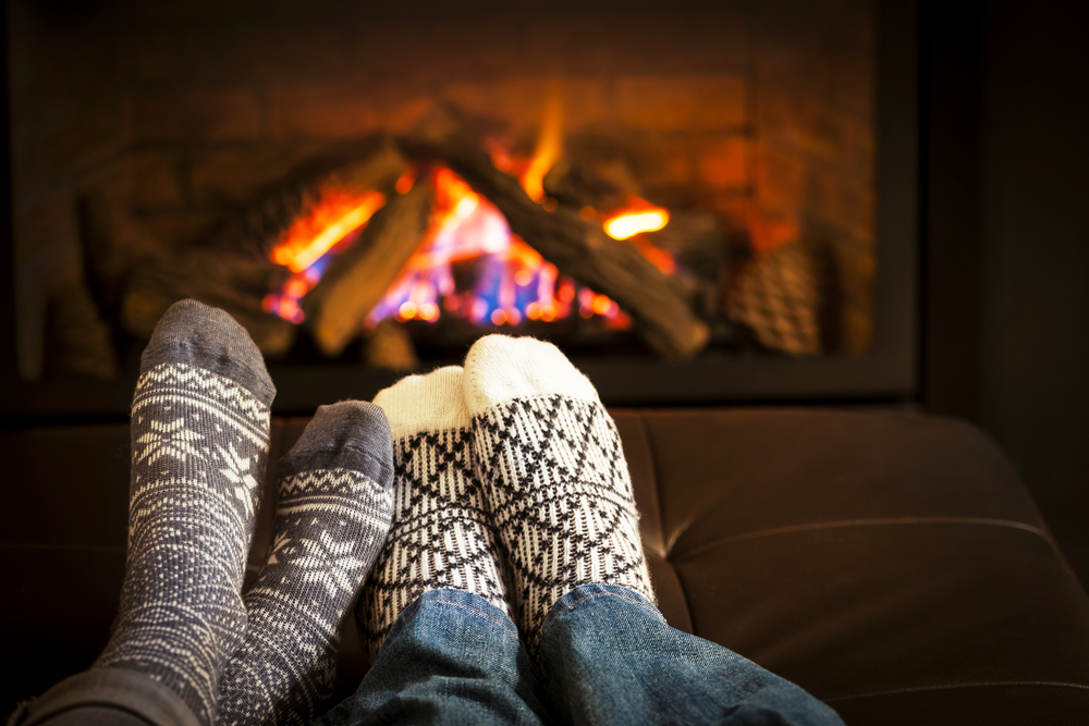 Homeowners warm toes by the fire